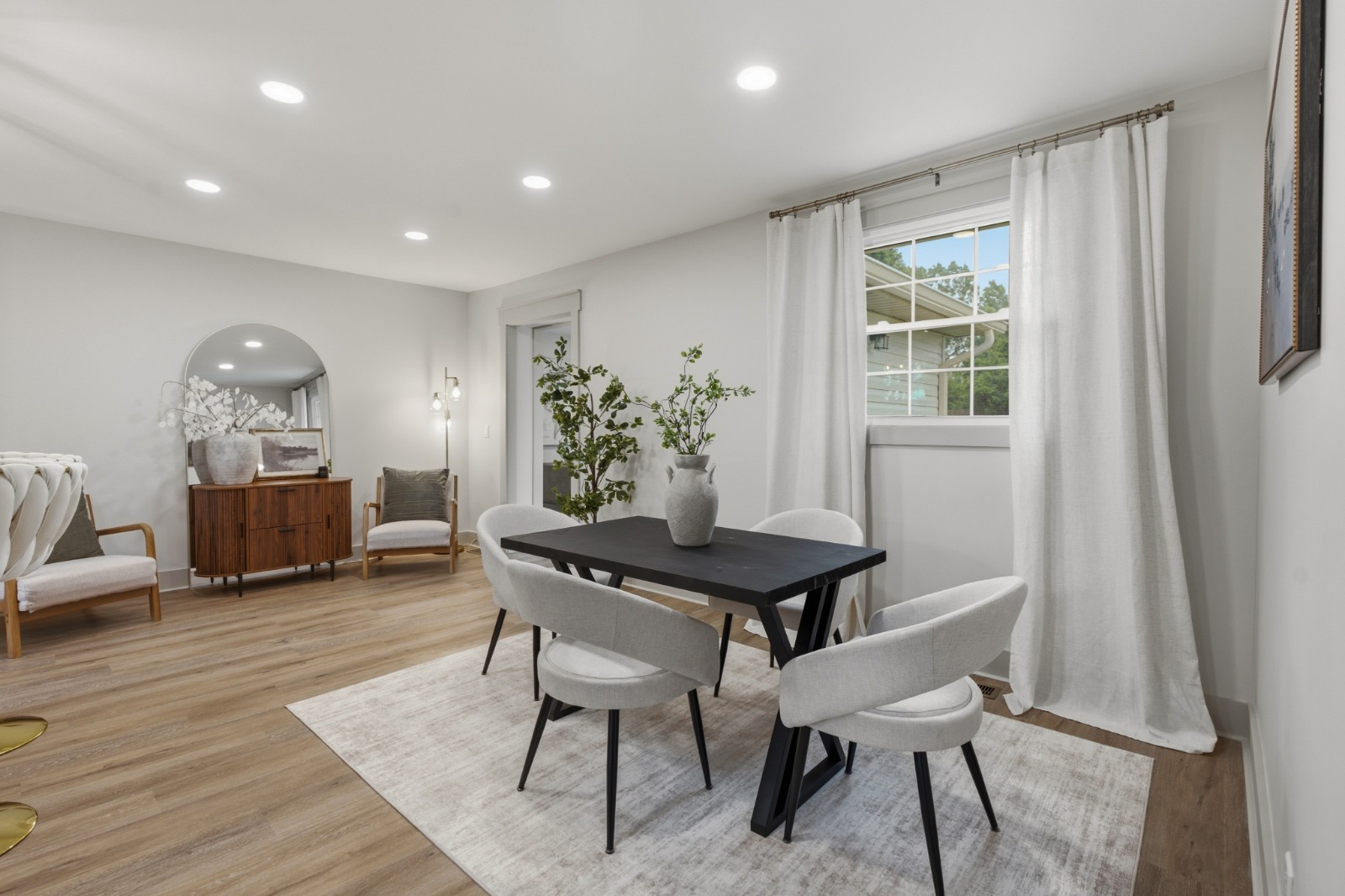 Light-filled living and dining space after a full renovation