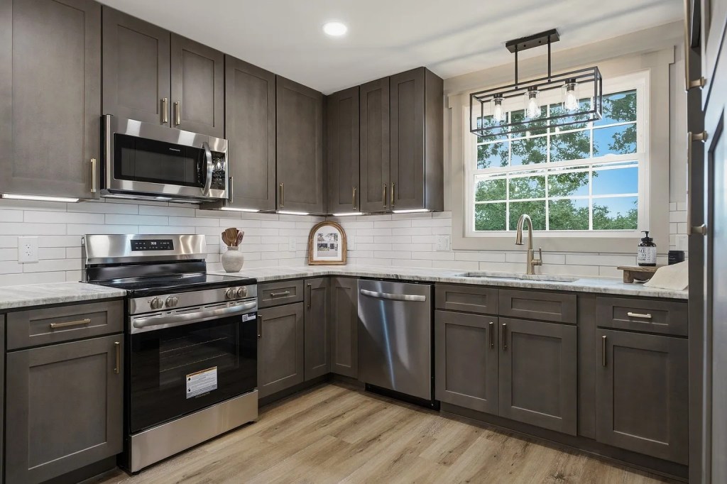 Kitchen remodeling with dark cabinets and updated countertops in Middle Tennessee